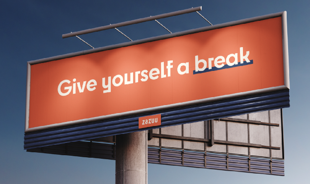 Billboard with text that reads "Give yourself a break"