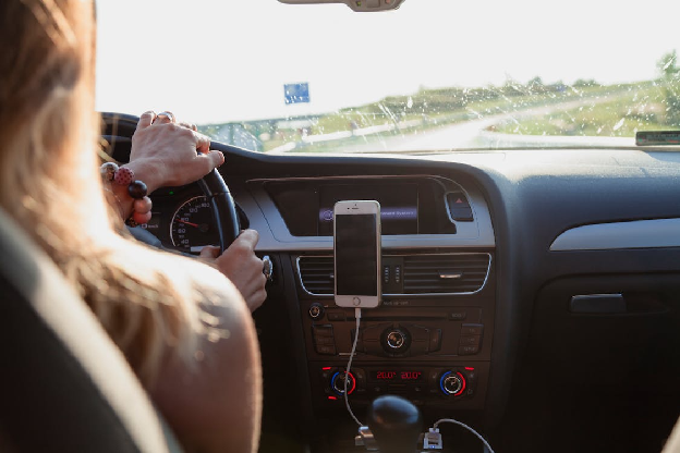 Photo Of Person Driving. Photo by Peter Fazekas from pexels.com