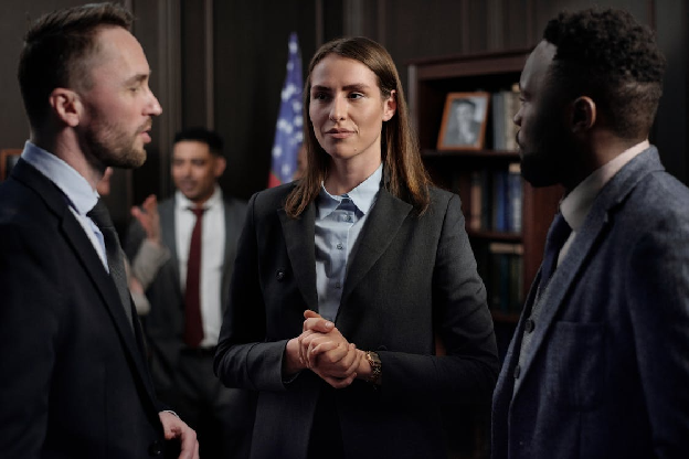 Business people Talking. Photo by August de Richelieu on pexels.com.