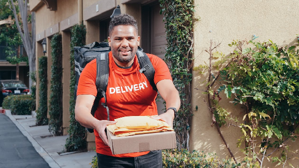 A Man Making a Delivery. Photo by Kindel Media on pexels.com